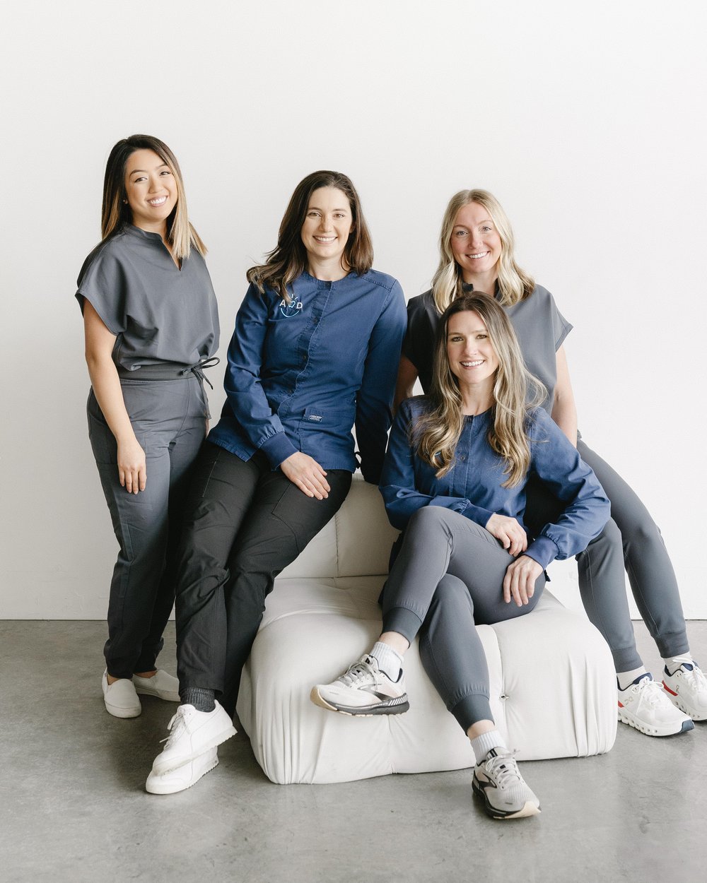 Atlas Dental team members laughing together