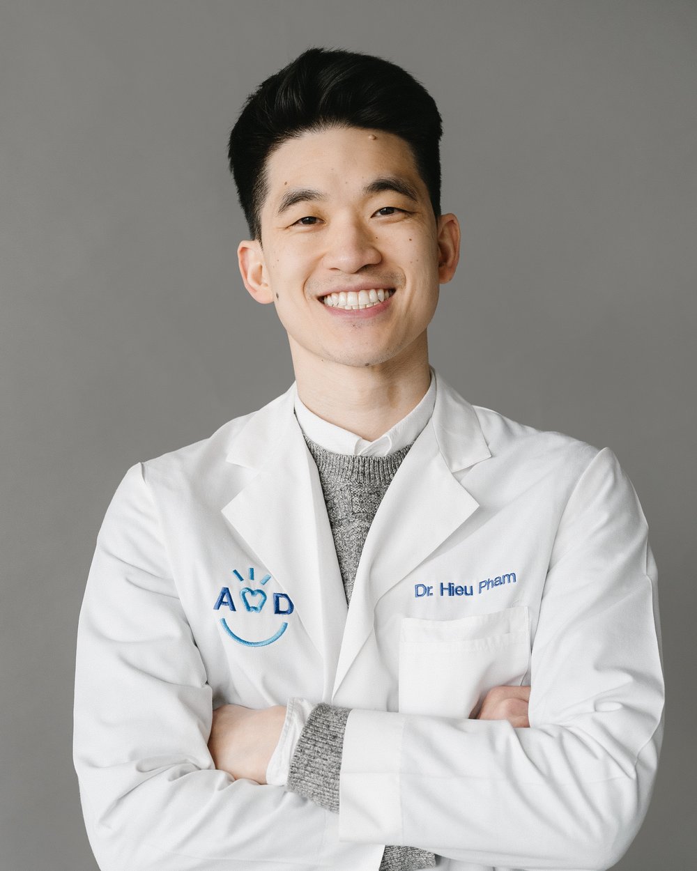 Dr. Hieu Pham in his white coat